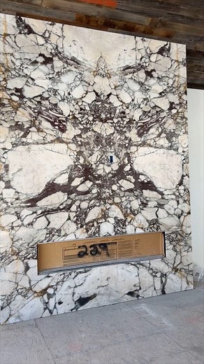 2.1K views | This Fireplace Costed $50,000! A total of 6 slabs! Would you spend this much money on your fireplace? Final reveal will be soon! | Nova Tile & Stone Homecenters | Facebook