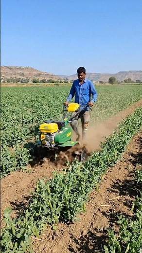 “Smart Agriculture: Farmer Using Power Tiller in Field”