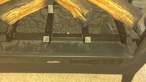 Duraflame electric fireplace keeps malfunctioning. For some reason it won’t turn off when it’s flickering, It’s also not heating. I took the back part out to clean it of dust yesterday, still no luck. Help!!