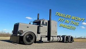 Check Out This "No Chrome" Race Rig and Its Double-Decker Trailer With Loft Living Space