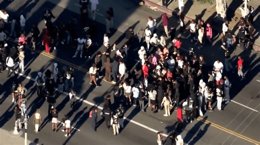 Skirmish line forms after man stabbed, crowd forms near MLK parade route in South LA
