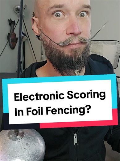 The Evolution of Electronic Scoring in Foil Fencing