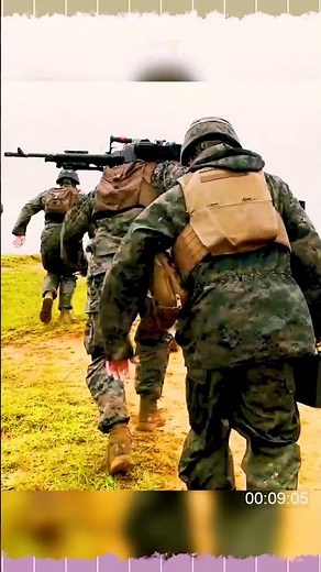 U S Marines with Japan soldier fire an M240B machine gun