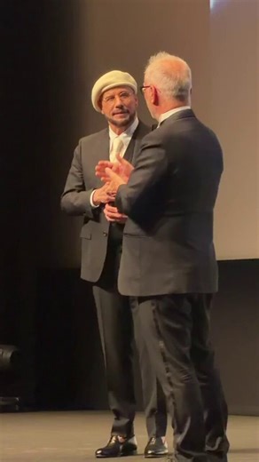 John Travolta cries as he receives a massive round of applause while accepting a surprise Palme d’Or at #Cannes.https://t.co/K2FMG43erz