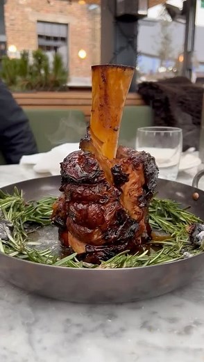 Parrillan on Instagram: "Glazed veal shank, slow-cooked, braised and served with rosemary. 🔥 A menu exploring Basque cooking techniques and exceptional ingredients, here’s a dish Chef Director @angelzapatabarrafina has been busy working on ahead of our opening @boroughyards this spring. We can’t wait to share it with you all."