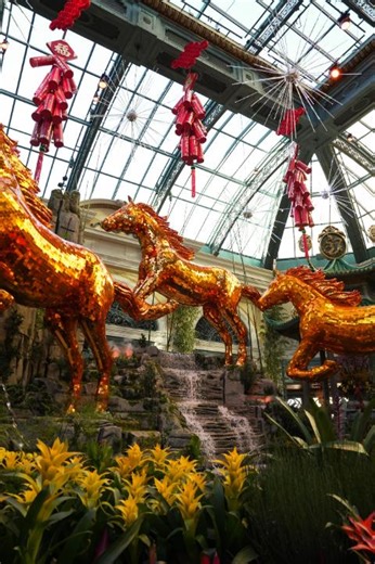 Bellagio’s Conservatory ushers in Lunar New Year with a vibrant tribute to the Year of the Fire Horse. Celebrating themes of courage, opportunity and passion, the display features dramatic sculptural installations including gilded horses, playful giant pandas, and lush immersive botanicals, on view through February. | Bellagio Las Vegas