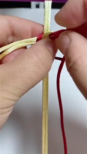 This is one way to make a knot in a rope when making a key chain.