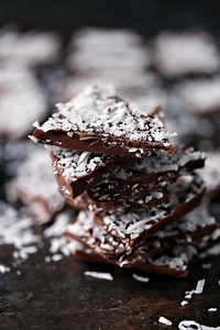 This CHOCOLATE COCONUT BARK is quick, easy and made with only 3 ingredients. This simple candy recipe is a must make for special occasions. Printable Recipe: https://www.cravingsofalunatic.com/coconut-bark-for-christmaspalooza/ | Cravings of a Lunatic