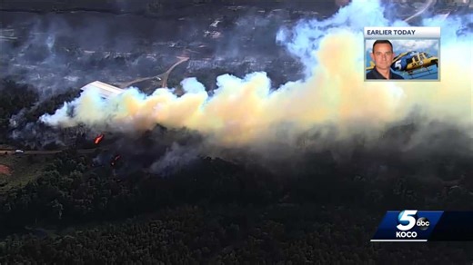 Crews continue battling large fire near Hinton