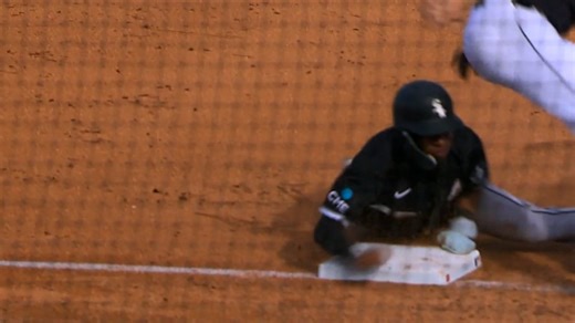 Darren Baker steals second and third base