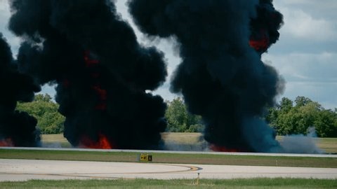 clip-3974065909-massive-black-smoke-billows-fire-on-airport