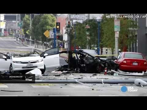 Tesla splits in half and burns after high speed crash