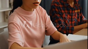 Slow motion back end software developer engineer for computer programming working together on debugging writing computing code, solving complex algorithms display on monitor in office. Burgeoning