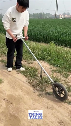 DIY manual garden plow assembly—perfect for tilling small rows