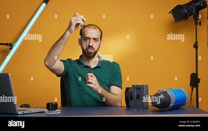 Recording review of cable with usb type c in studio for vlog. Professional studio video and photo equipment technology for work, photo studio social media star and influencer Stock Photo - Alamy