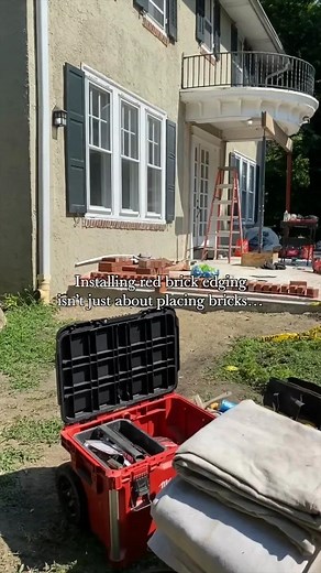 A clean brick border isn’t luck—it’s layout, precision, and the right materials. When we install red brick edging around a flagstone walkway, every step matters: mapping the curve, prepping a stable base, setting each brick to the exact height, and checking level and alignment as we go. The result? A crisp, durable edge that protects the walkway and gives the whole space a finished, timeless look. Craftsmanship you can see. Quality you can trust. | Kelly Masonry