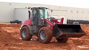 Powerful and efficient, the Takeuchi TW95 delivers exceptional performance, comfort, and serviceability. It is an ideal loader for a wide range of applications including load and carry, snow removal, and feedlots. | Takeuchi