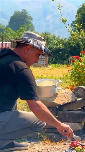 Charred vegetables, grilled peppers, fresh herbs, and spices tossed over open flame. A rustic fire-grilled salad ready to serve #OutdoorCooking #GrilledVegetables #FireCooking #Cooking | Easy life