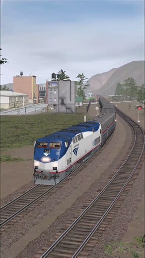 Amtrak passenger train taking a smooth curve through the mountains 🚆#Railfan #AmericanRailroad #Frei