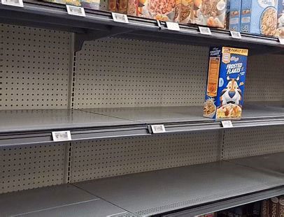 Empty shelves in Walmart as residents prepare for winter storm in southern Missouri