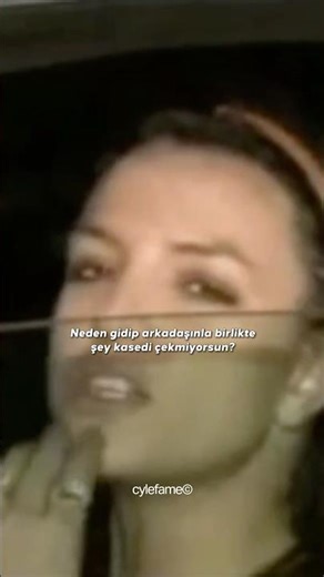 Britney Spears mocks gay paparazzi who are following her.