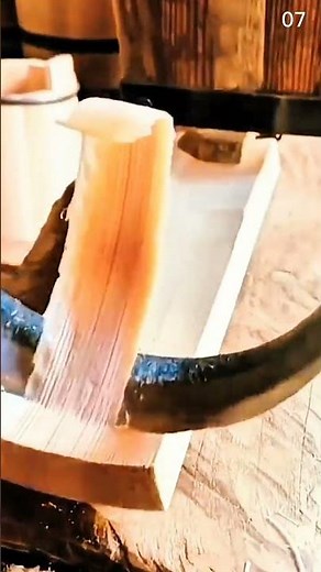 Cutting rectangular wooden board using handheld coping saw