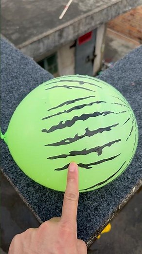Experiment: Will a water balloon explode if it rolls down a tall building? 💥🎈 #balloon