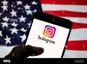 March 27, 2021, China: In this photo illustration the American photo and video-sharing social networking service owned by Facebook, Instagram logo is seen on an Android mobile device with United States of America (USA), commonly known as the United States (U.S. or US), flag in the background. (Credit Image: © Budrul Chukrut/SOPA Images via ZUMA Wire Stock Photo - Alamy