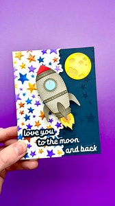 This easy DIY Valentine’s Day card is out of this world!🚀❤️ I started off by embossing and cutting using the Starry Night Embossing Folder Combo. This creates the coolest looking textured stars!⭐️ I added color to them using the coordinating stencils and Simon Hurley inks in the colors: no diving, midnight snack, crown me, shooting star, and prom queen. To add a bit of sparkle, I tapped some Astro Paste in the color Slippery When Wet through the stencil. Then, I cut out the rocket ship and moon