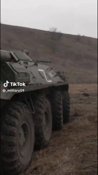 Military Tank Maneuvers in Remote Field