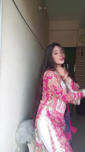Traditional South Asian Dance in Pink Salwar Kameez