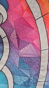 I can't wait to share how I machine quilt an area without getting stuck! Learn how during my FREE Mastering Swirls machine quilting video series starting Jan. 7th. To register for free, click here: https://quiltingismytherapy.com/mastering-swirls-free-motion-challenge-quilting-along/ | Machine Quilting by Angela