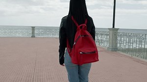 Woman Red Backpack Walking On Beachside Stock Footage Video (100% Royalty-free) 3503178665 | Shutterstock