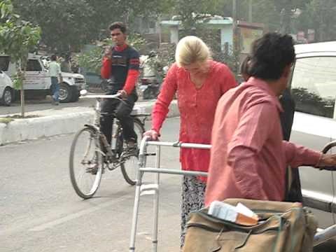 Amanda Walking with Leg Braces in the Streets of Delhi - One Brave Woman!