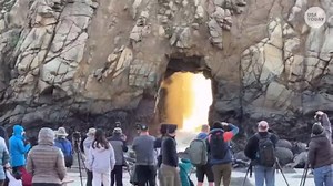 Watch the sunset line up with Keyhole Arch in a rare, natural phenomenon that occurs during a short period of time at Pfeiffer Beach in Big Sur, California. | USA TODAY