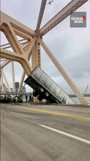 Truck driver dangling from bridge dramatically rescued over Ohio River 🚚 #rescue #US