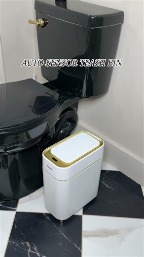 This auto-sensor touchless trash can is a total game changer for your bathroom! It opens