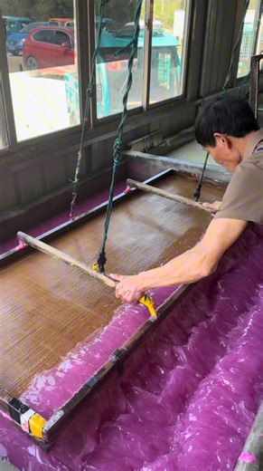 Artists Universum 🖌️ on Instagram: "The craft starts with tree bark and rice straw, soaked and beaten into a smooth pulp. A bamboo screen is carefully dipped into the vat, then lifted to collect a thin, even layer of fibers. The fresh sheet is transferred onto a warm surface, where it dries slowly into light, refined paper. Prized for its durability, absorbency, and timeless elegance, Xuan paper has been used by calligraphers and ink painters for generations. Remarkably, many artworks created o