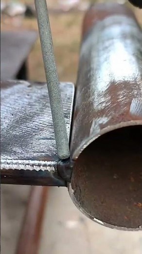 Arc welding process joining two metal pieces