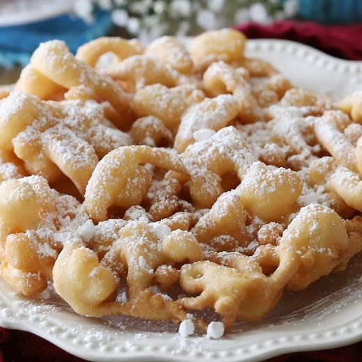Learn how to make your own carnival-worthy Funnel Cakes at home with just a handful of ingredients! RECIPE: https://sugarspunrun.com/funnel-cake-recipe/ | Sugar Spun Run