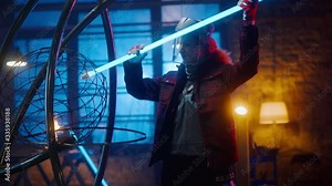 Young Contemporary Female Artist is Installing Blue Tube Lamps in Her Metal Sculpture in a Studio Workshop. Empowering Woman Makes Modern Brutal Abstract Artwork Out Of Metal and Lamps.