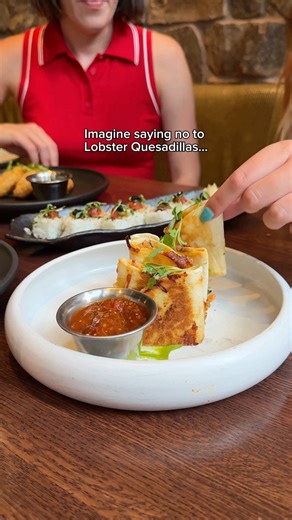 An elevated classic: poached lobster folded into a crisp, golden quesadilla with tomatillo salsa, bacon, and avocado yuzu purée. 🦞 | Toro by Chef Richard Sandoval - Denver