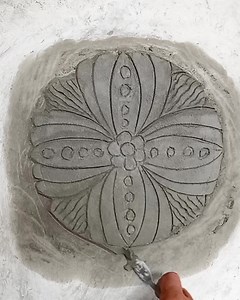 Cement wall art circle design | Andris Brick Art