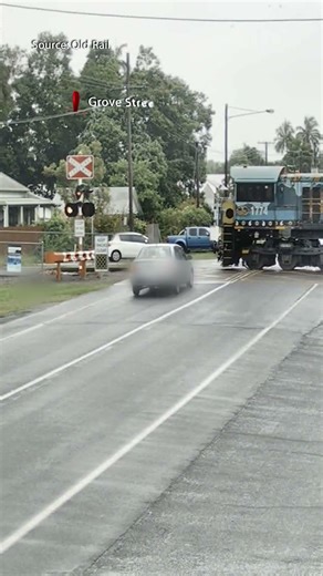 Horror moment Cairns cars hit train