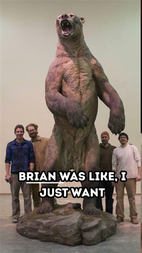 GIANT HUMAN AGAINST A BLACK HUGE BEAR BY JOE ROGAN