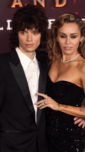 #MileyCyrus’s glittering black @Gucci gown wasn’t the only thing dazzling on the red carpet last night. Attending the LA premiere of ‘Avatar: Fire and Ash’ with her boyfriend #MaxxMorando, attention was quick to turn to a noteworthy piece of jewellery on the singer’s ring finger. Cue: a flurry of engagement rumours online. | British Vogue