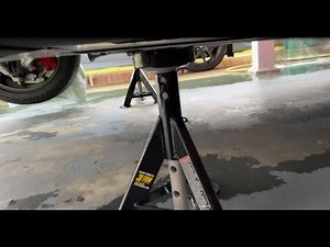 One way to put a Tesla Model 3 on Jack Stands