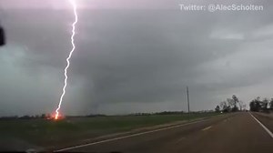 #14 TVN storm chase video of 2014! Cloud-to-ground lightning strike just a few hundred feet away in eastern AR on February 20 on tornado warned supercell crossing the MS River. There were 37 tornado and 435 severe wind reports on this day. This video was shot by storm chase @AlecScholten from our two-vehicle caravan that day in Dixie Alley. Please help us let it rip on our Live platform in 2015 by supporting our Indiegogo project.. Even $1 goes a long way! https://www.indiegogo.com/projects/tvnw