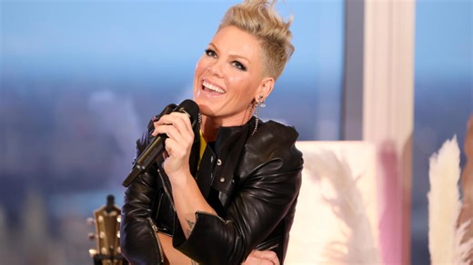 Pink reacts as fan throws mum's ashes on stage
