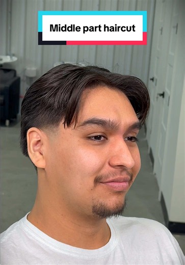 Stylish Middle Part Haircut with Layers by Expert Barber